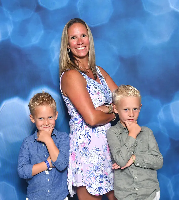 Crystal Snow, founder and owner of Snow & Sons Roofing, with her sons